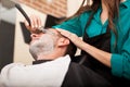 Young man getting a shave