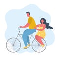 Young man with girl is riding a bike