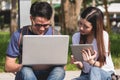 Young Man and girls friend classmates sitting consult Royalty Free Stock Photo