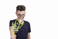 A young man gives a withered bouquet of flowers Royalty Free Stock Photo