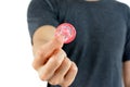 Young man giving condom Royalty Free Stock Photo