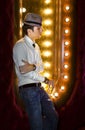 Young man with glass of wine Royalty Free Stock Photo