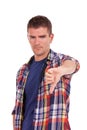 Young man going thumb down Royalty Free Stock Photo