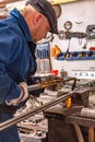 The young man, is going to cut a piece of metal autogenous welding. Royalty Free Stock Photo