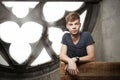 Young man in gothic church