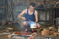 Young man doing a barbecue Royalty Free Stock Photo