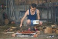 Young man doing a barbecue Royalty Free Stock Photo