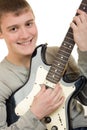 The young man with a guitar Royalty Free Stock Photo