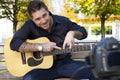 Young man guitar teacher making a videos Royalty Free Stock Photo