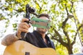 Young man guitar teacher making a videos Royalty Free Stock Photo