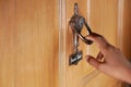young man hand knocking door, Royalty Free Stock Photo