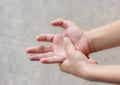 Young man with hand pain