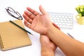 Young man hand pain in office Royalty Free Stock Photo