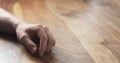 Young man hand waiting tapping fingers sitting at the table