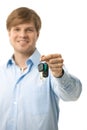 Young man handing over ignition keys