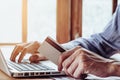 Young man hands holding a credit card Royalty Free Stock Photo