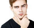 Young man handsome face closeup, guy looking at camera over Royalty Free Stock Photo