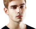 Young man handsome face closeup, guy looking at camera over Royalty Free Stock Photo