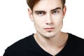 Young man handsome face closeup, guy looking at camera over Royalty Free Stock Photo