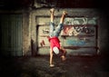 Young man handstands, grunge Royalty Free Stock Photo