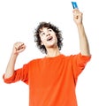 Young man happy holding credit card portrait