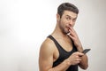 Young man has found a secret sms of his wife`s phone Royalty Free Stock Photo