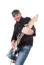 Young man with hat and beard play on electric guitar with enthusiasm. Isolated on white