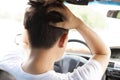 Young man have a big trouble while driving car. Royalty Free Stock Photo