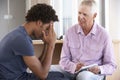 Young Man Having Counselling Session Royalty Free Stock Photo