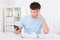 Young man having financial problems Royalty Free Stock Photo