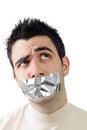 Young man having gray duct tape on his mouth Royalty Free Stock Photo