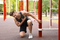 Young man having heart attack on ground Royalty Free Stock Photo