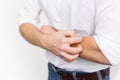 Young man having itchy and dry skin problem Royalty Free Stock Photo