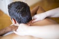 Young man having massage Royalty Free Stock Photo