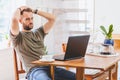 Stressful man working on laptop Royalty Free Stock Photo