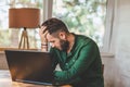 Young man having stressful time working Royalty Free Stock Photo