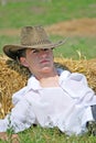 Young man on hay bale Royalty Free Stock Photo