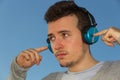 Young Man with Headphones Music