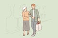 Young man helps old woman to carry heavy bag from grocery store, for concept respect for pensioners