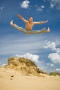 Young man in a high karate jump