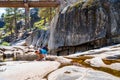 Young man hiking in the Yosemite National park. Exploring the valley Royalty Free Stock Photo