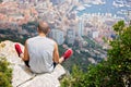 Young man on a hill above Monaco, contemplating the view Royalty Free Stock Photo