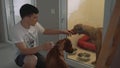 Young man with his dog in the infirmary for animals