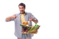 The young man with his grocery shopping on white Royalty Free Stock Photo