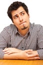 Young man in his mid-20s with thoughtful expressio Royalty Free Stock Photo