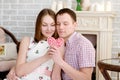 Young man and his pretty girlfriend hold heart