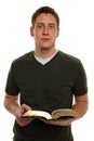 Young Man Holding Bible Royalty Free Stock Photo