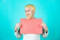 Young man holding blank sheet. Season sales. Royalty Free Stock Photo