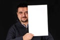Young man holding blank sign. Royalty Free Stock Photo
