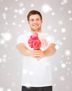 Young man holding bouquet of flowers Royalty Free Stock Photo